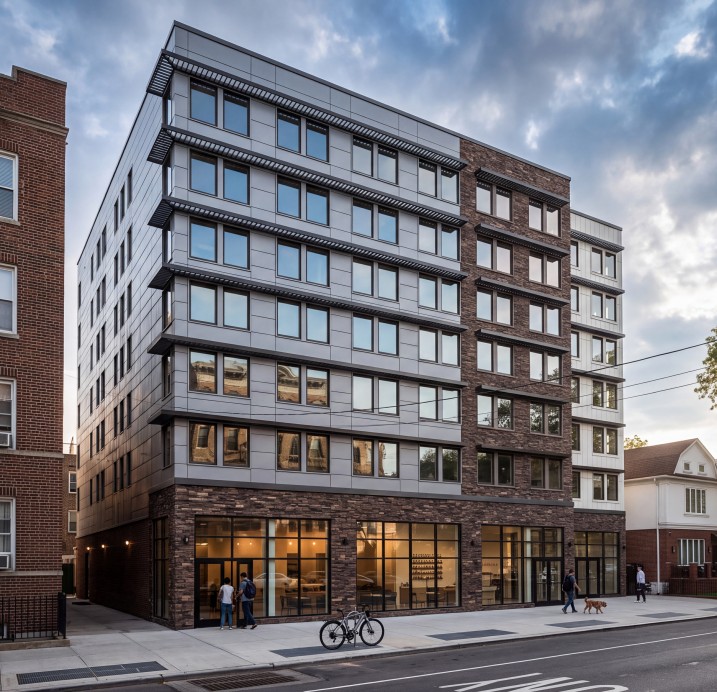 Rendering of a brick and metal panel apartment building with ground floor storefronts on a Brooklyn street